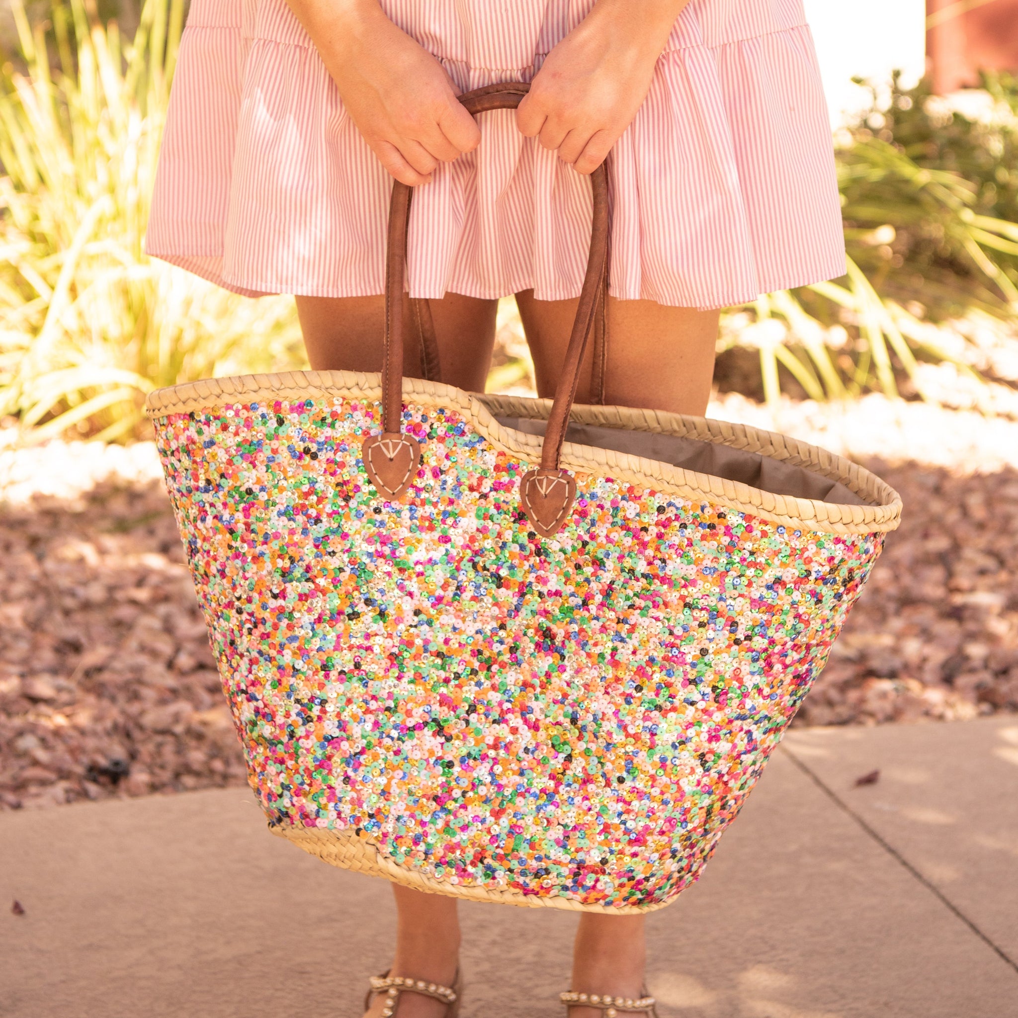 Girl holding Large Straw Shoulder Bag with Multi-Colored Sequins